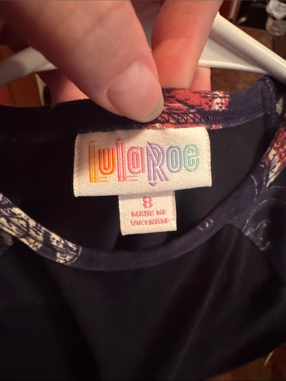 LuLaRoe Black Stretchy Tee with Nightmare Before Christmas Characters. - Picture 7 of 11